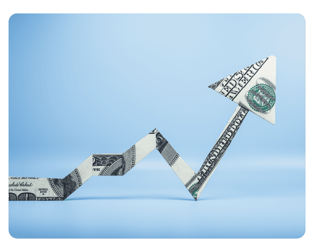 A folded U.S. dollar bill forms a zigzag upward arrow against a light blue background, symbolizing financial growth or rising profits—an image that resonates with the forward-thinking vision of Convergence Opportunity Technology Advisors.