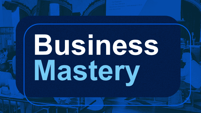 Text graphic with the words "Business Mastery" in bold white and light blue letters, overlaid on a dark blue background with a faint image of people working or attending a seminar.