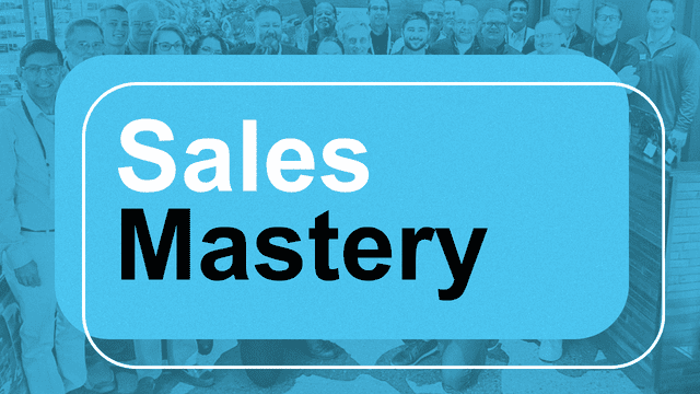 A group of people pose together in the background, overlaid with a large blue rectangle containing the words "Sales Mastery" in bold white and black text.