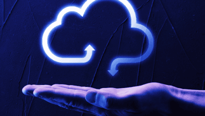 A hand is held out under a glowing cloud icon with up and down arrows, representing cloud computing or data transfer—an apt visual for those exploring how to use AI effectively or consulting resources like the Data Center Playbook ebook—set against a dark textured background.
